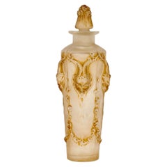 1920 René Lalique Bottiglia di profumo in vetro Pan Satyres con patina seppia