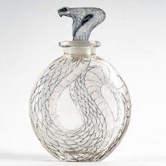 1920 Rene Lalique Serpent Parfümflasche Klarglas mit blauer Patina, Schlange