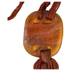 1920 René Lalique Serpents Pendant Orangy Amber Glass, Snakes