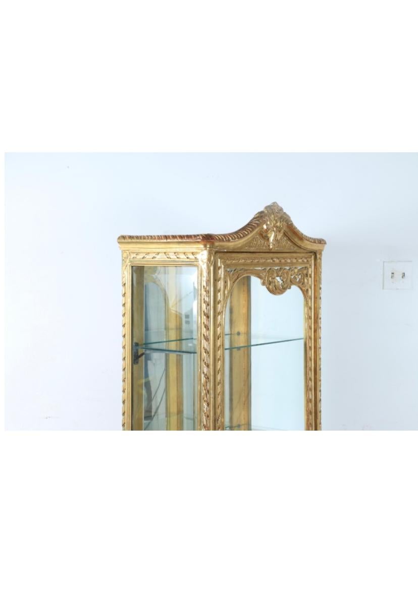gold curio cabinet