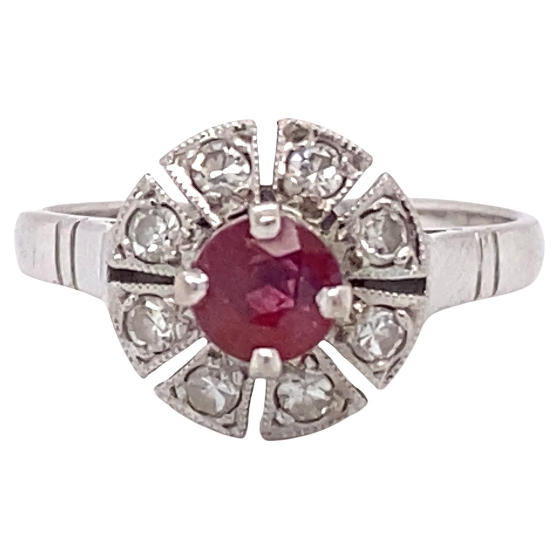 1920s 0.45 Carat Ruby and Diamond Ring in Palladium For Sale