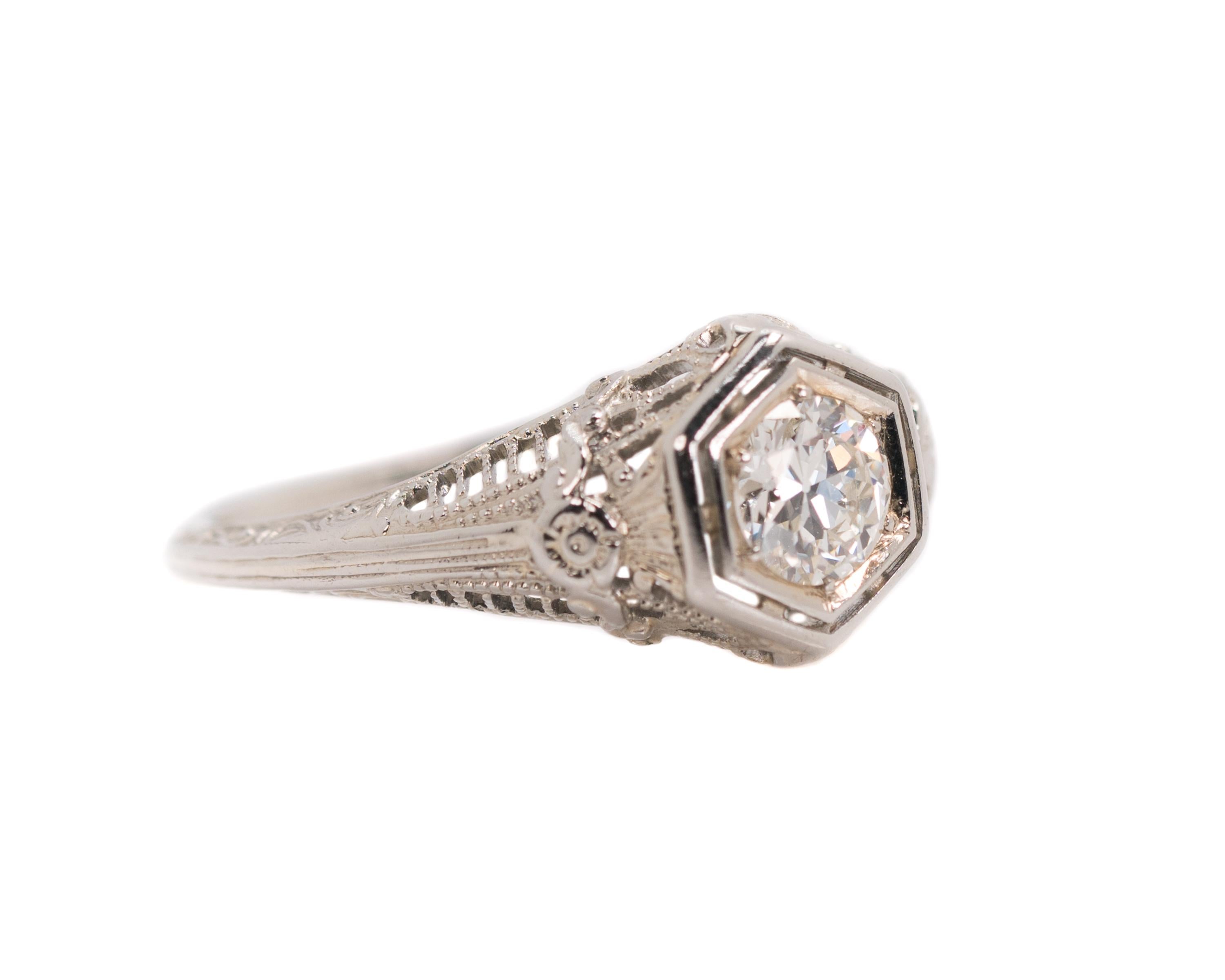 1920s Art Deco Diamond Solitaire Engagement Ring - 18 Karat White Gold, Diamond

Features:
0.50 carat Round Old European Diamond center stone securely set with 6 prongs
18 Karat White Gold Filigree Setting with an open Gallery and shoulders
Double