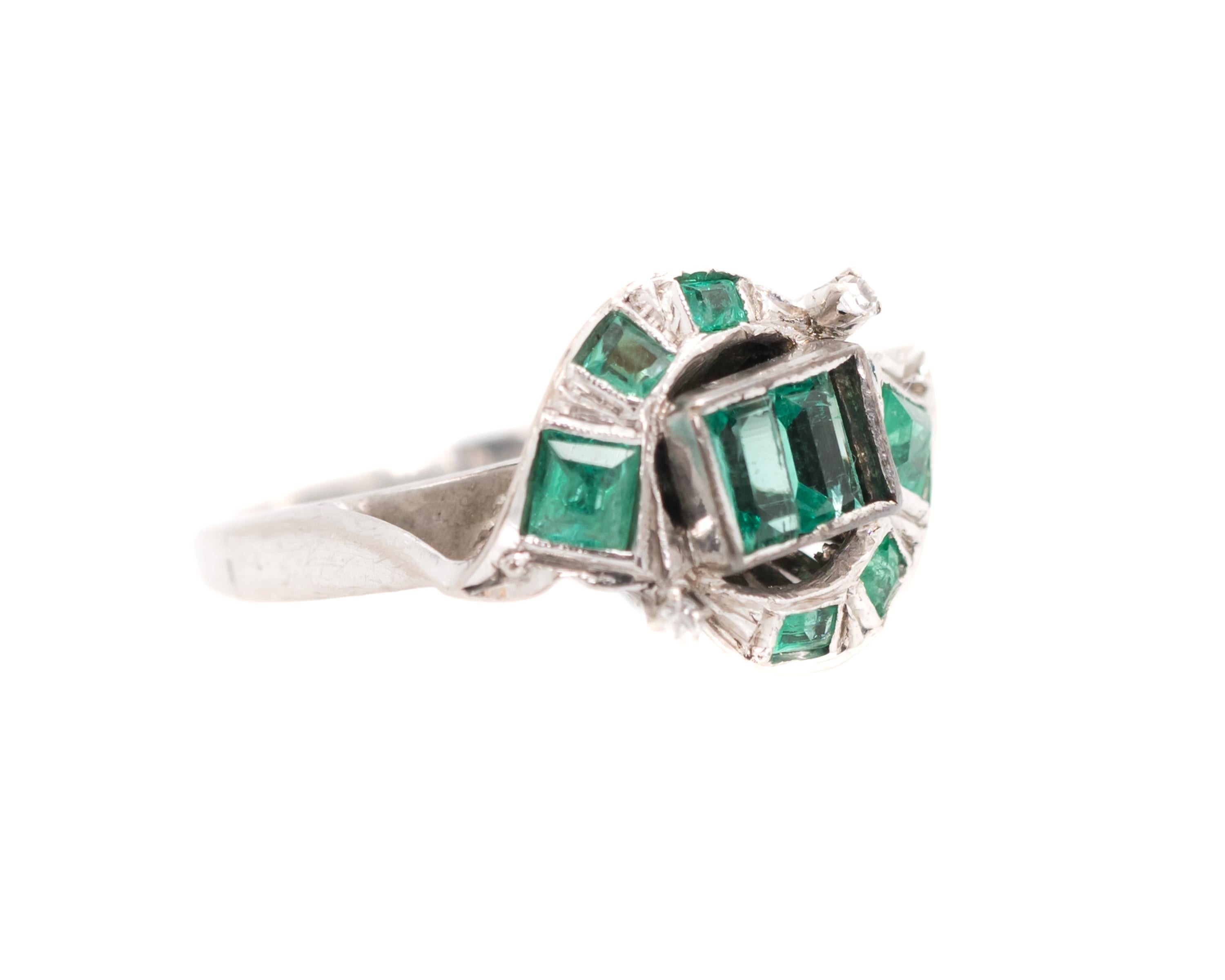 Art Deco 1920s 0.75 Carat Colombian Emerald and 18 Karat White Gold Bypass Ring