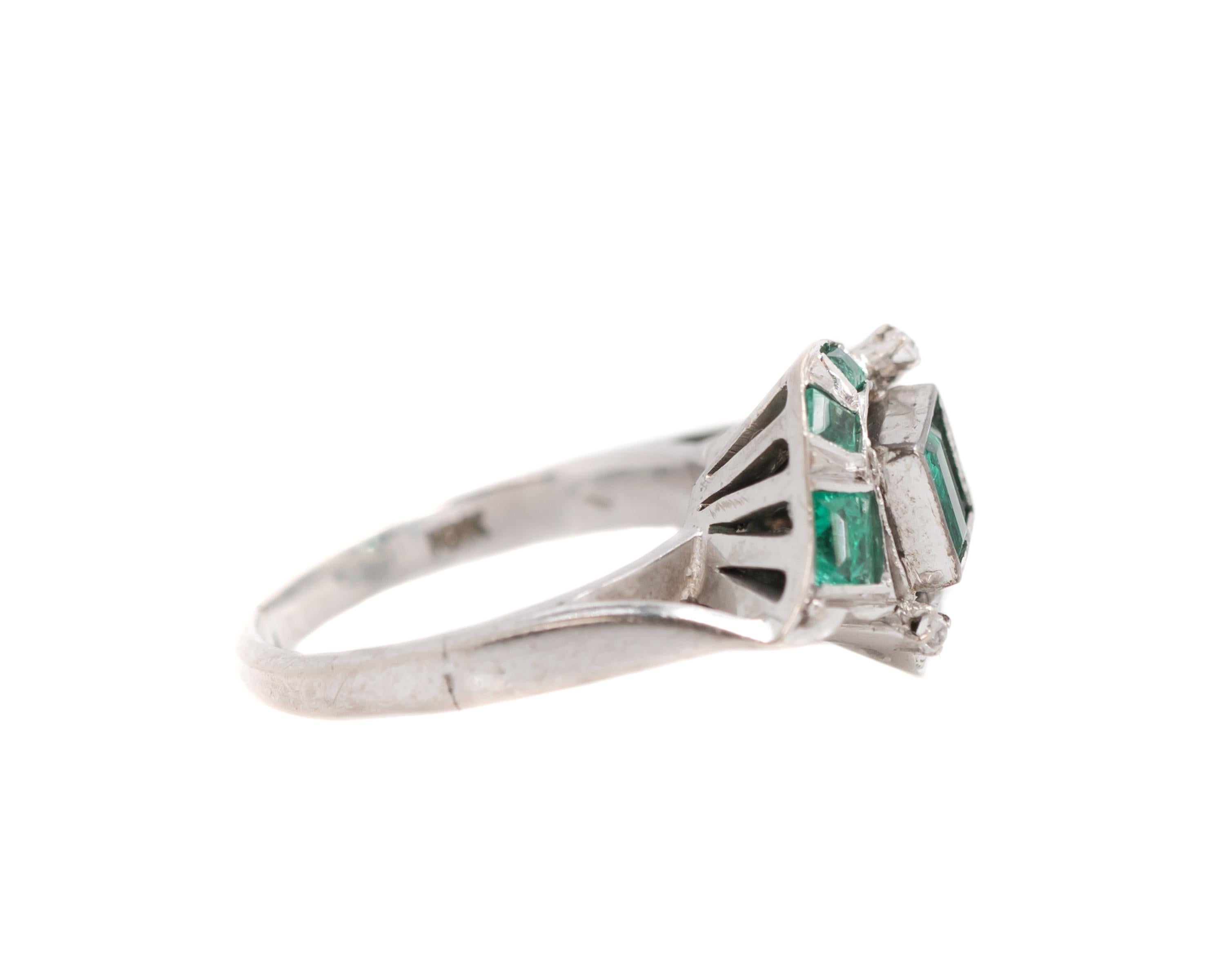 Emerald Cut 1920s 0.75 Carat Colombian Emerald and 18 Karat White Gold Bypass Ring