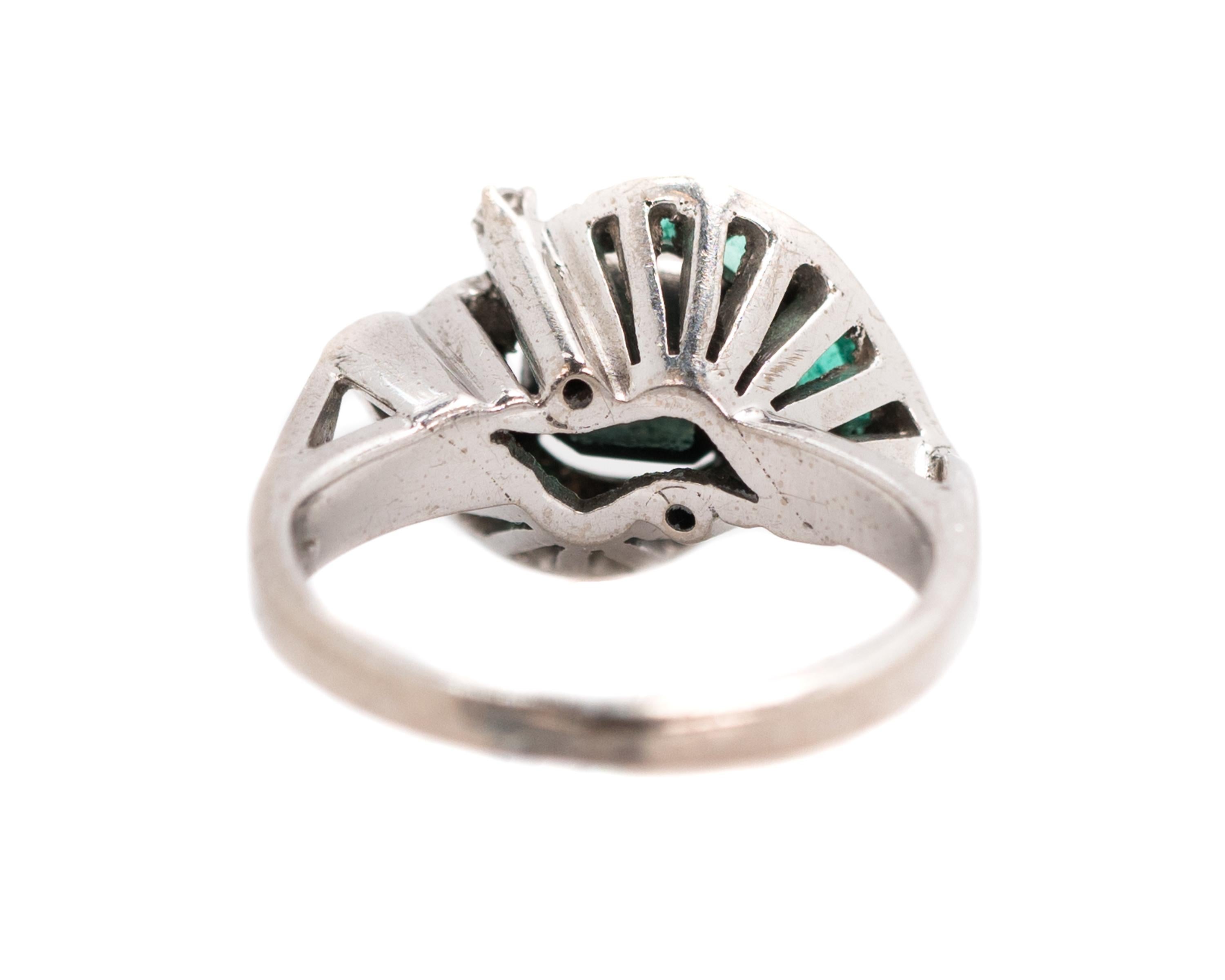 1920s 0.75 Carat Colombian Emerald and 18 Karat White Gold Bypass Ring In Good Condition In Atlanta, GA