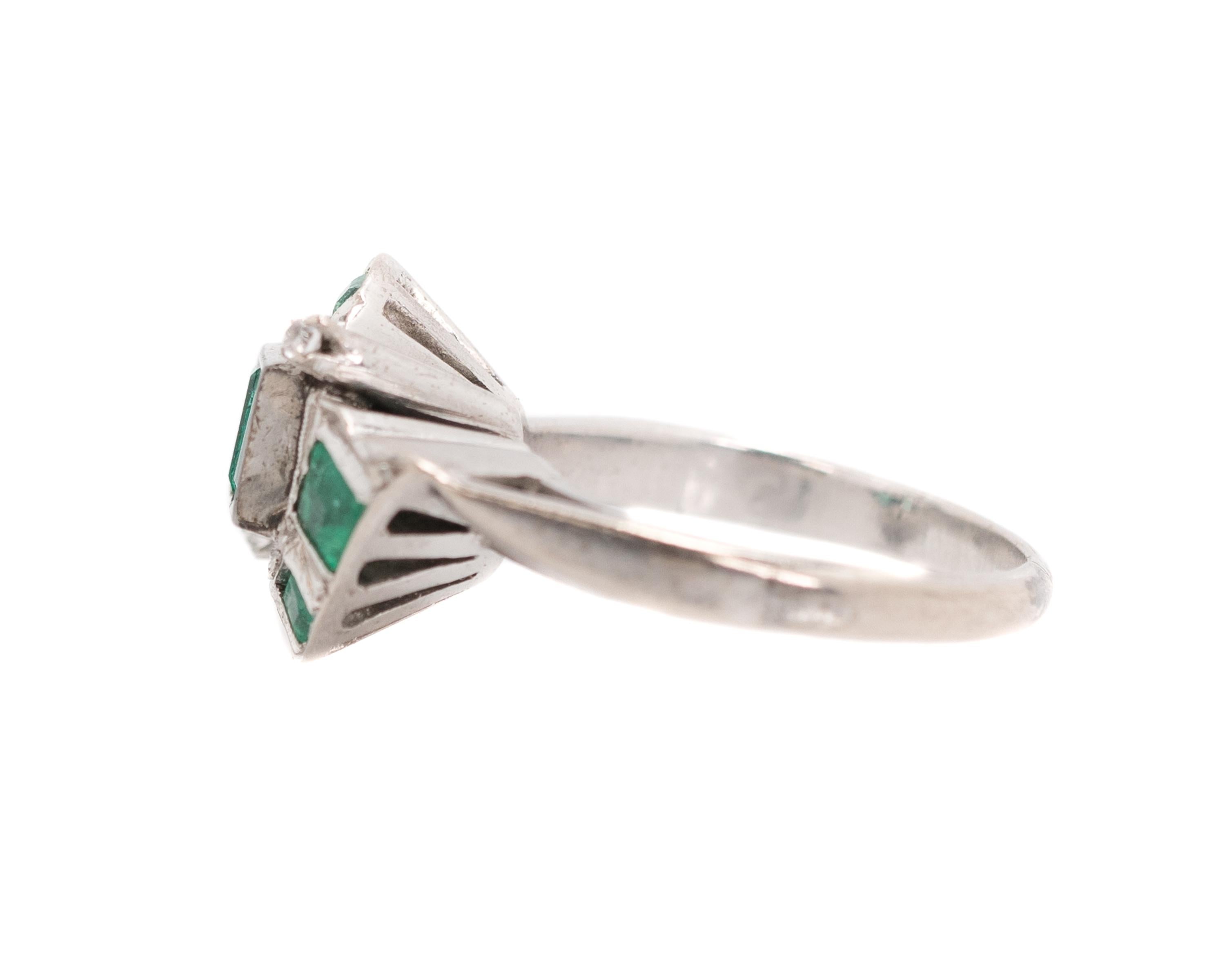 Women's 1920s 0.75 Carat Colombian Emerald and 18 Karat White Gold Bypass Ring