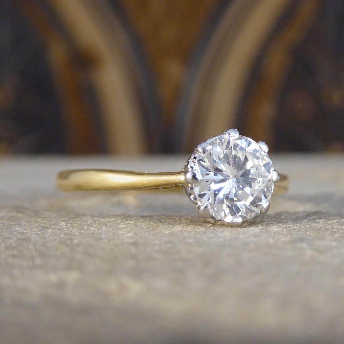 Step back in time with our 1920's 1.00ct Diamond solitaire engagement ring, a treasure that blends the elegance of yesteryears with timeless beauty. Expertly crafted in 18ct yellow gold and crowned with a platinum setting, this exquisite piece