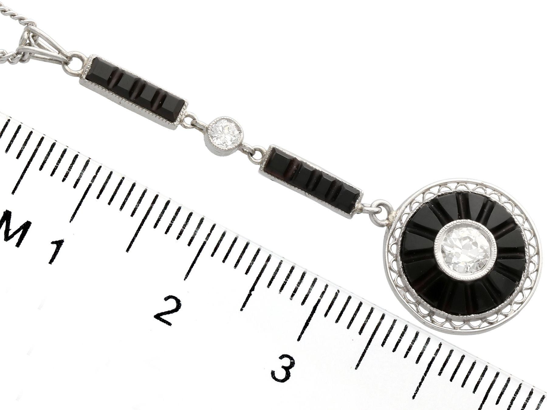 Women's 1920s 1.05 Carat Onyx and Diamond Platinum Pendant