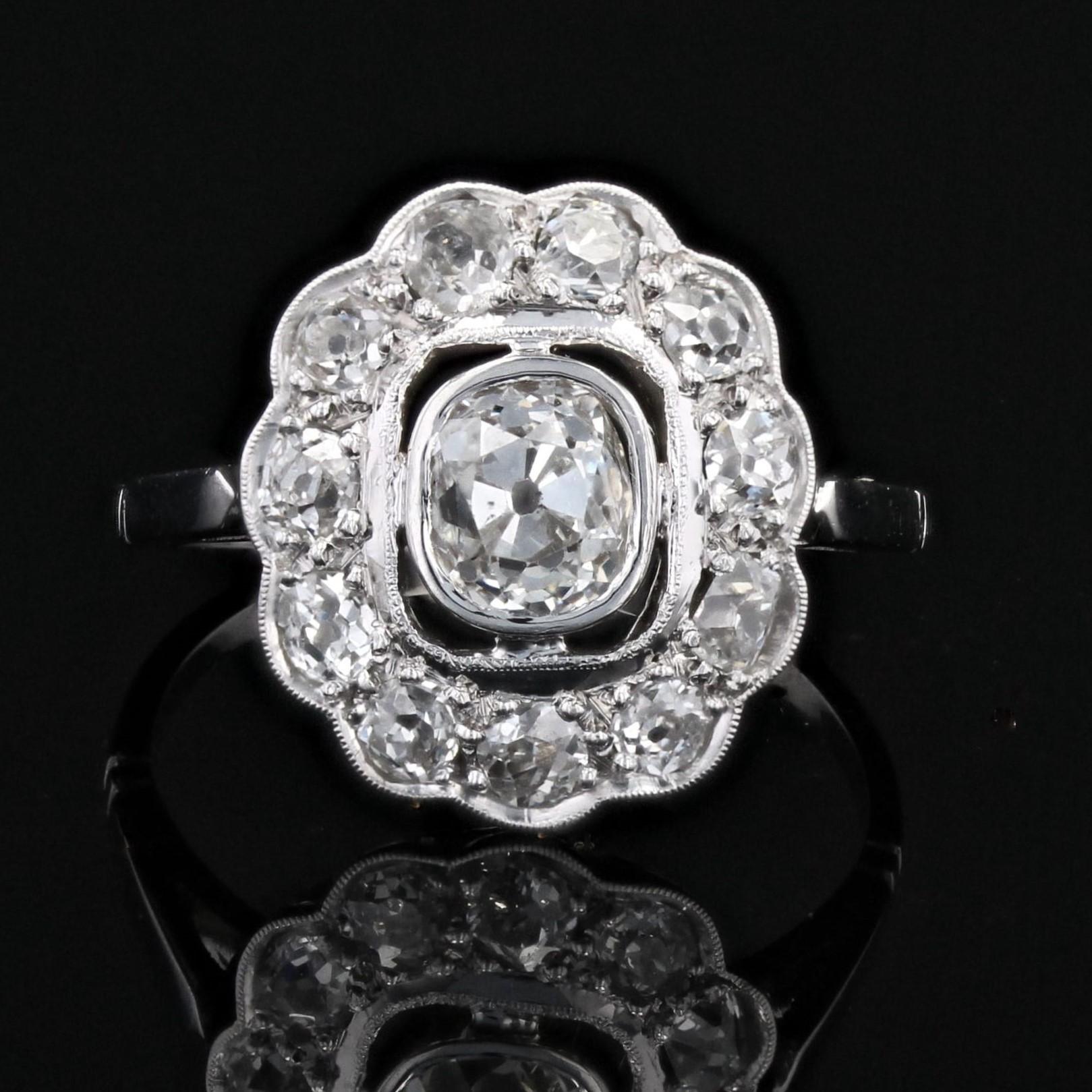 Belle Époque 1920s 1, 35 Carat Diamond Platinum Flower Cluster Ring