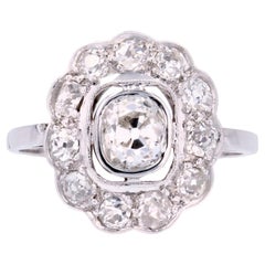 1920s 1,35 Carat Diamond Platinum Flower Cluster Ring