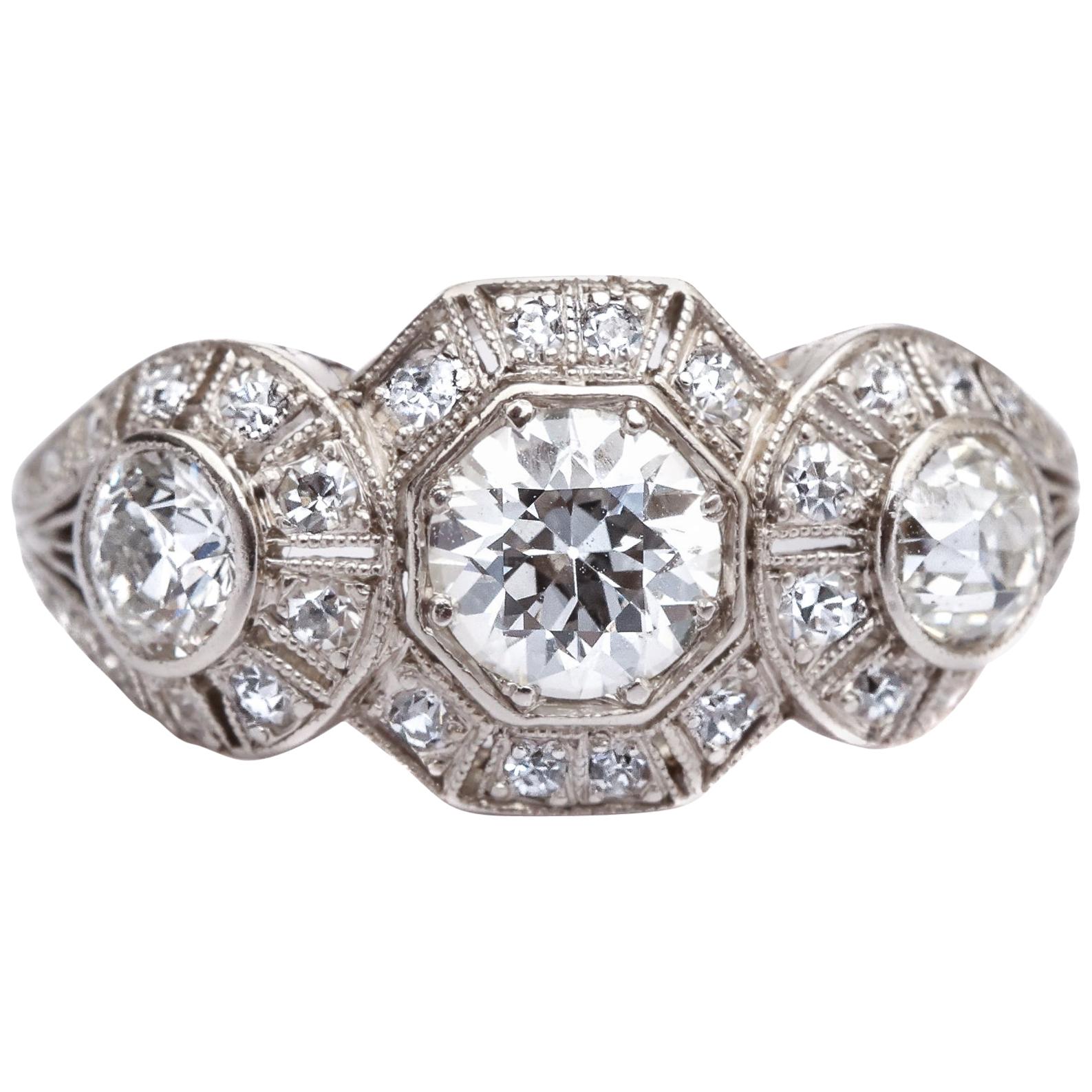 1920s 1.40 Carat Total 3-Stone Diamond Platinum Engagement Ring