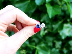 1920s 1.45 Carat Diamond 1.58 Carat Sapphire Platinum Twist Ring