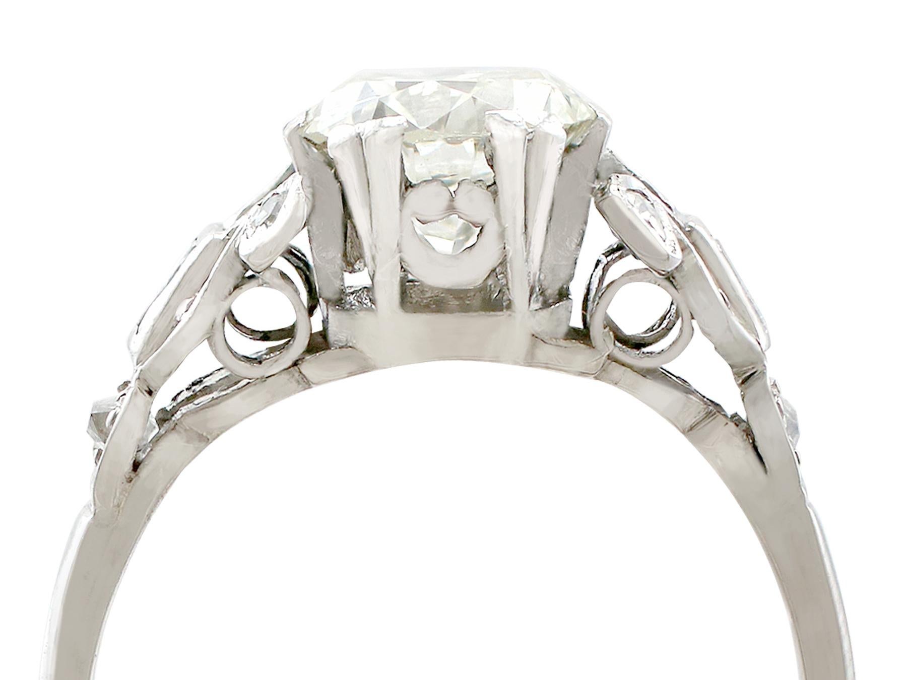 A stunning antique 1920's 1.50 carat diamond and platinum solitaire style engagement ring; part of our diverse antique jewellery and estate jewelry collections.

This stunning, fine and impressive solitaire diamond ring with baguettes has been