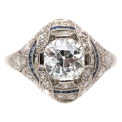 1920s 1.59 Carat Diamond Art Deco Platinum Ring with French Cut Sapphires