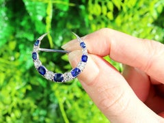 1920s 1.88 Carat Sapphire and 1.04 Carat Diamond White Gold Crescent Brooch