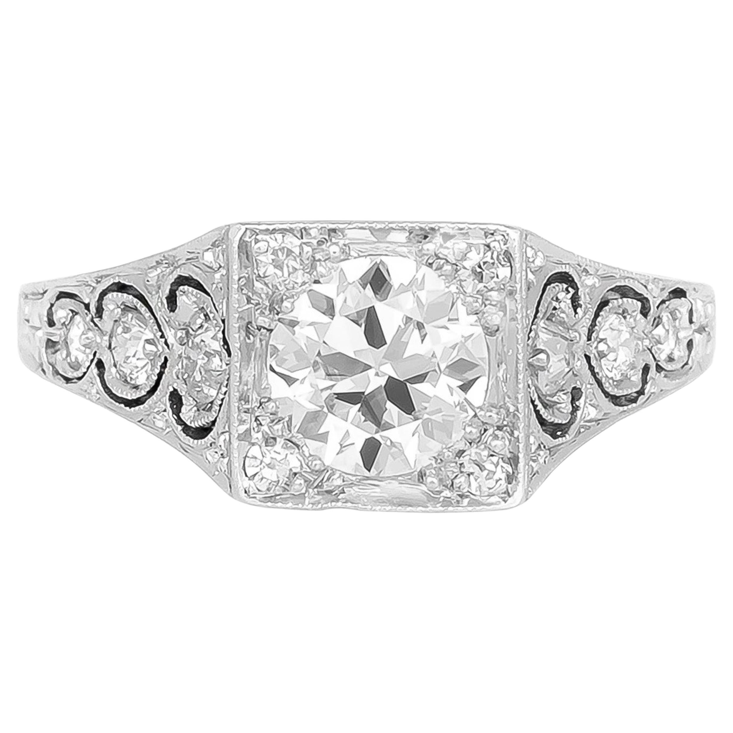 Bague de fiançailles avec un magnifique diamant rond filigrane des années 1920-1930