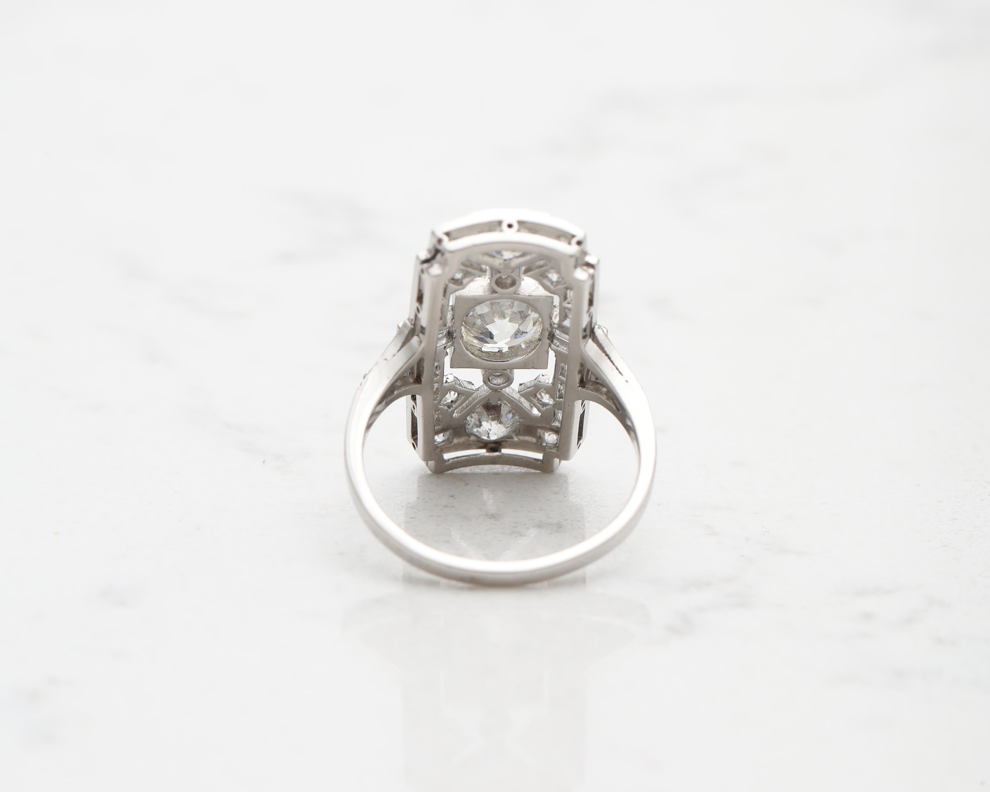 1920s 2.40 Carat Total Diamond Engagement Shield Ring in Platinum In Excellent Condition In Atlanta, GA