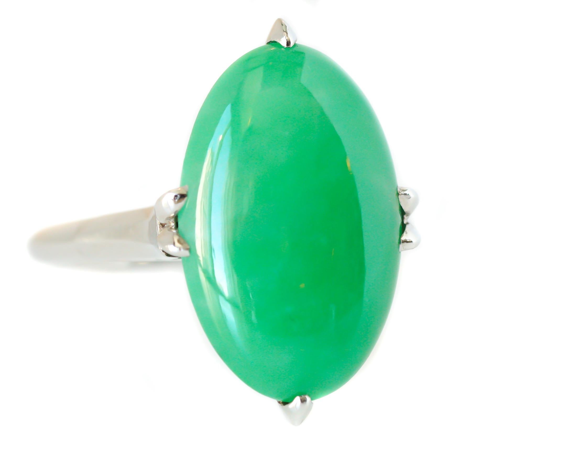 1920s Art Deco Jade Ring crafted in Platinum and 18 karat White Gold

Features:
3.0 carat Oval Jade Cabochon, 6-prong setting, light to medium green in color.
Platinum and 18 karat White Gold Setting. The setting is a beautiful cathedral style with