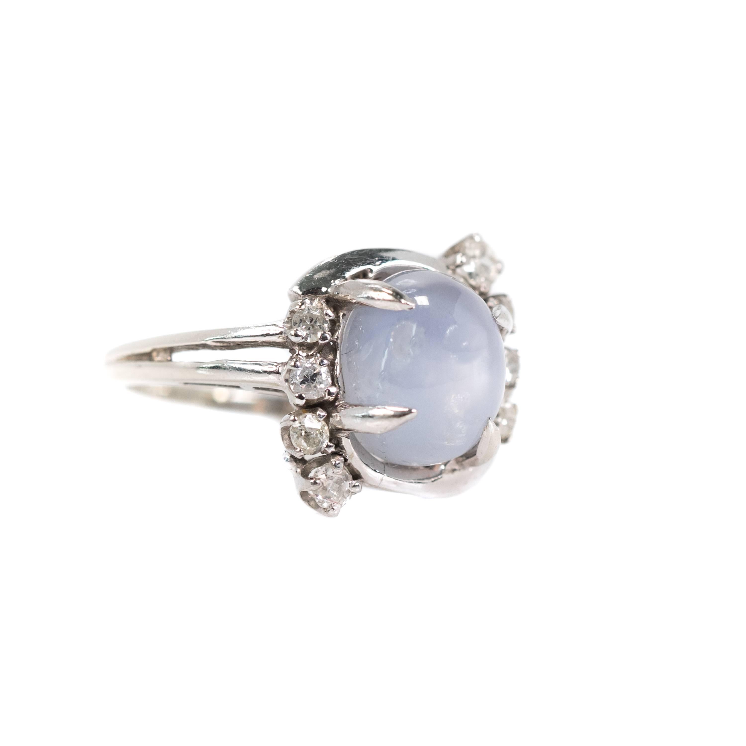 1920s Art Deco Star Sapphire Ring - 14k White Gold, Star Sapphire, Diamonds

Features a 3 carat Star Sapphire oval cabochon flanked by 8 single cut Old Mine Diamonds. 
The Star Sapphire is held securely in place by 4 long talon prongs. The sparkling