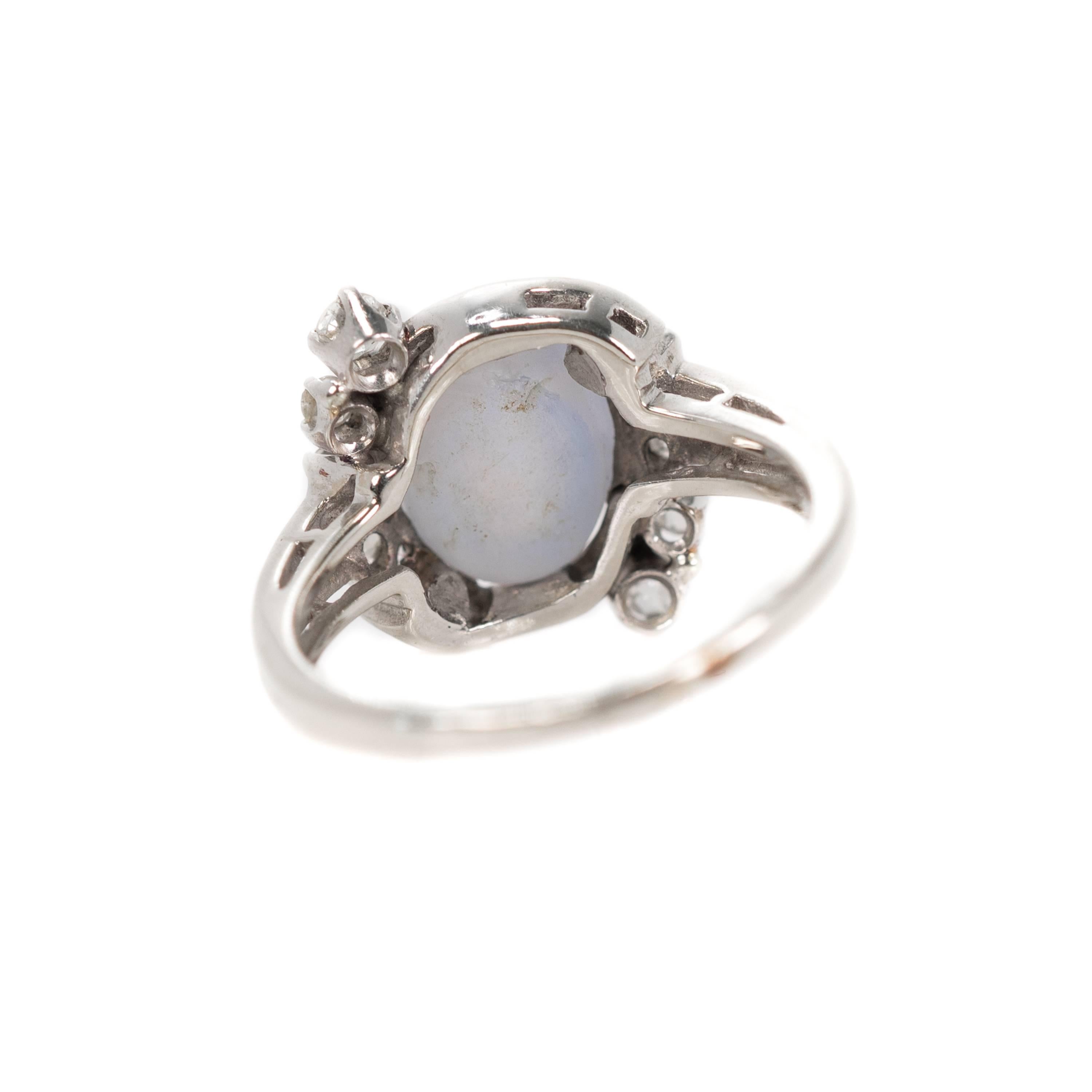 Oval Cut 1920s 3 Carat Star Sapphire and 0.25 Carat Diamond 14 Karat White Gold Ring