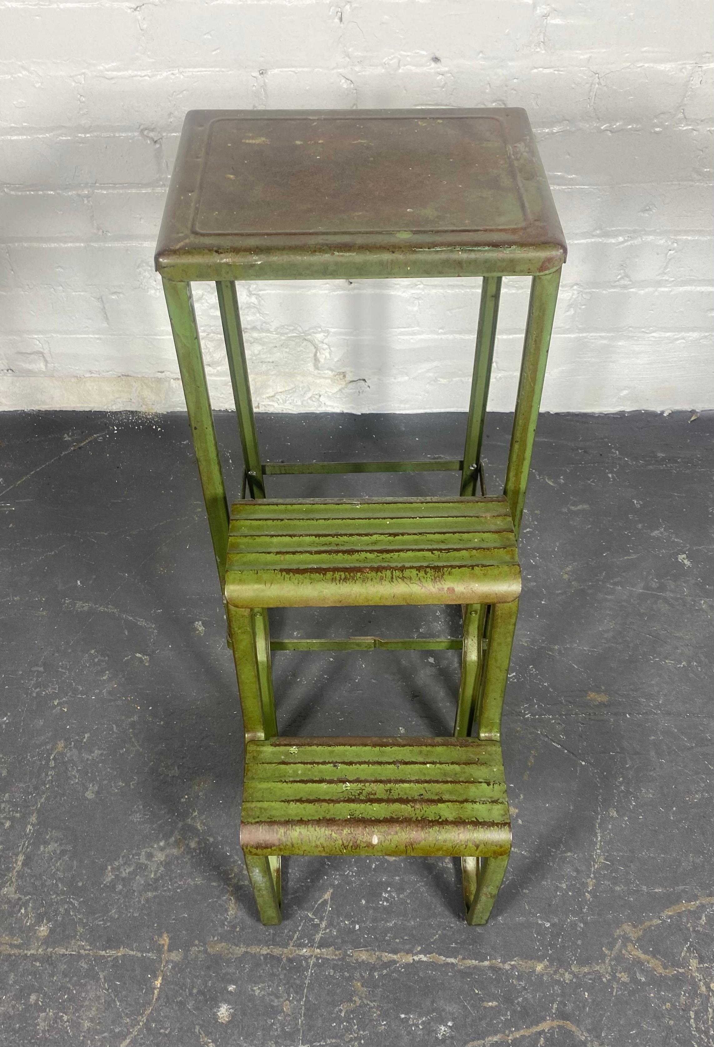 1920s -30s Industrial Pressed steel step stool, wonderful patina , great design In Distressed Condition For Sale In Buffalo, NY