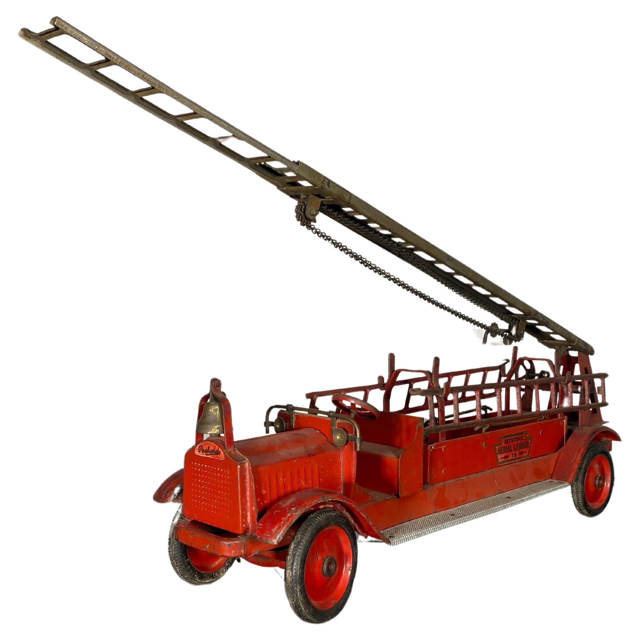 1920S / 30S kEYSTONE Pressed steel Fire Truck Ariel Ladder 79,  Packard.. Fully functional. Retains its removable ladders,, All labels in tact. Wonderful original condition..12 1/2 in. high x 8 1/2 in. wide x 30 1/2 in. deep