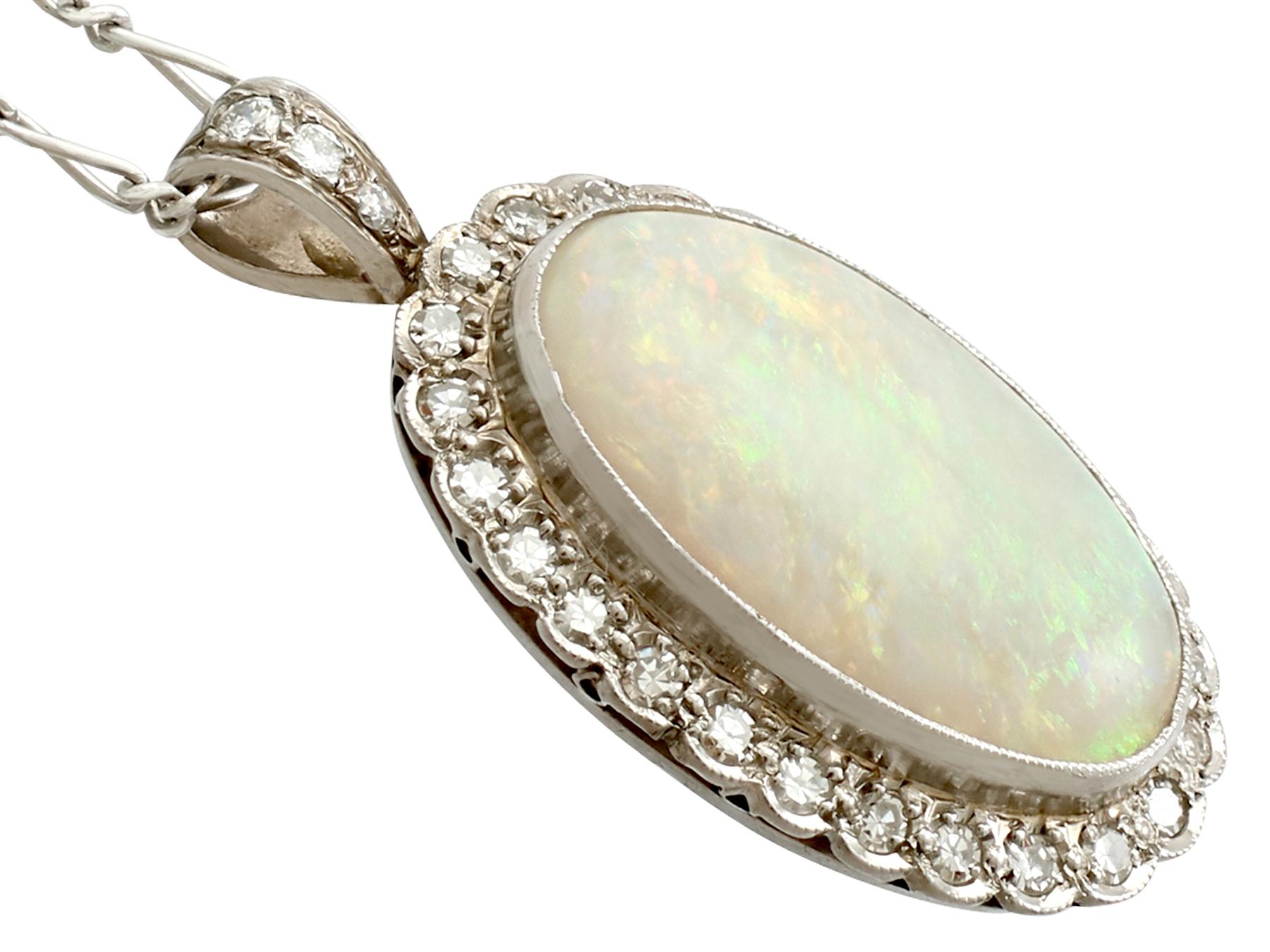 Oval Cut 1920s 8.18 Carat Opal and Diamond Earring and Pendant Set For Sale