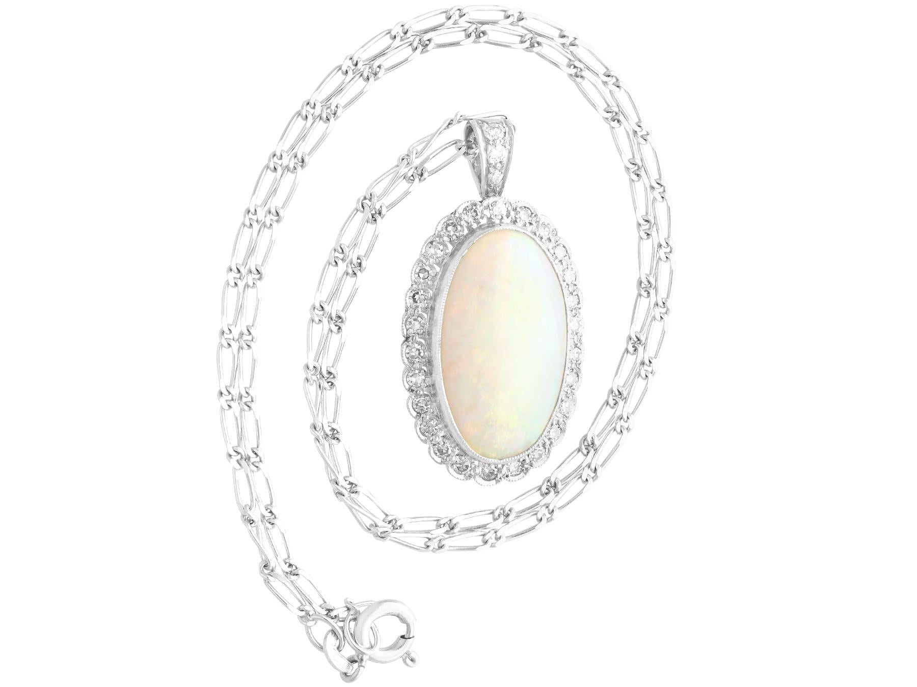 Oval Cut 1920s 8.18 Carat Opal and Diamond Earring and Pendant Set For Sale