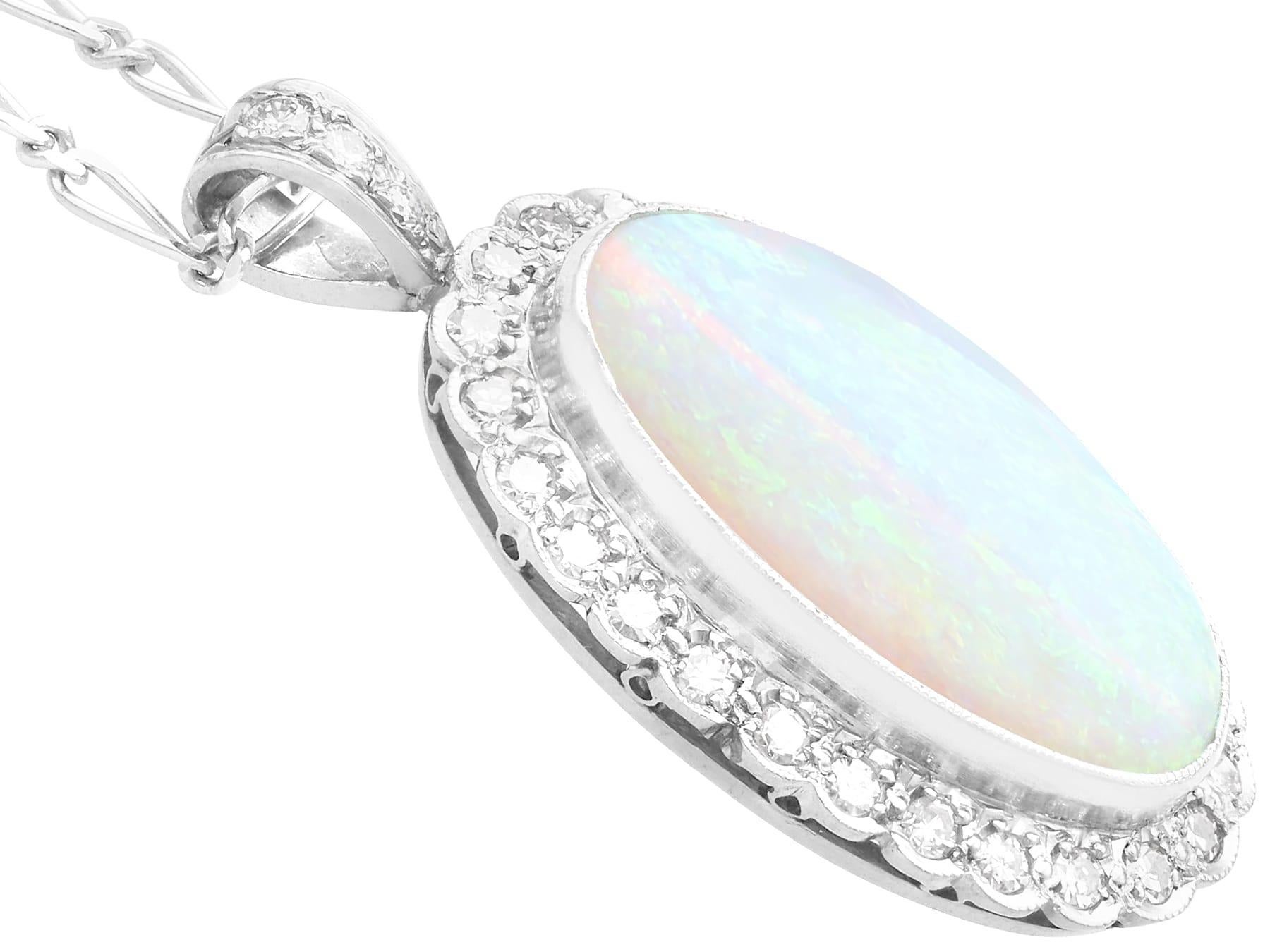 Women's 1920s 8.18 Carat Opal and Diamond Earring and Pendant Set For Sale