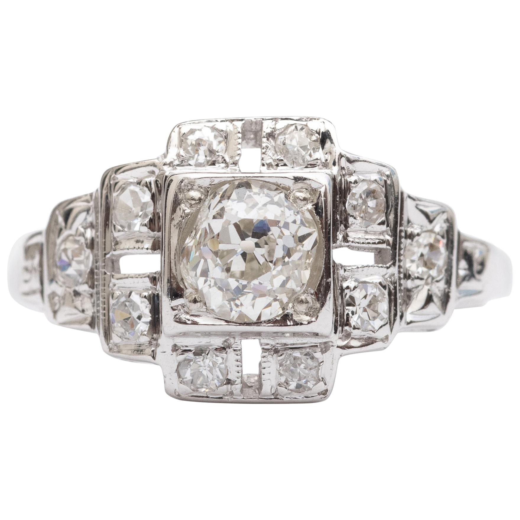 1920s .85 Carat Total Diamond Engagement Ring, 14 Karat Gold and Platinum For Sale