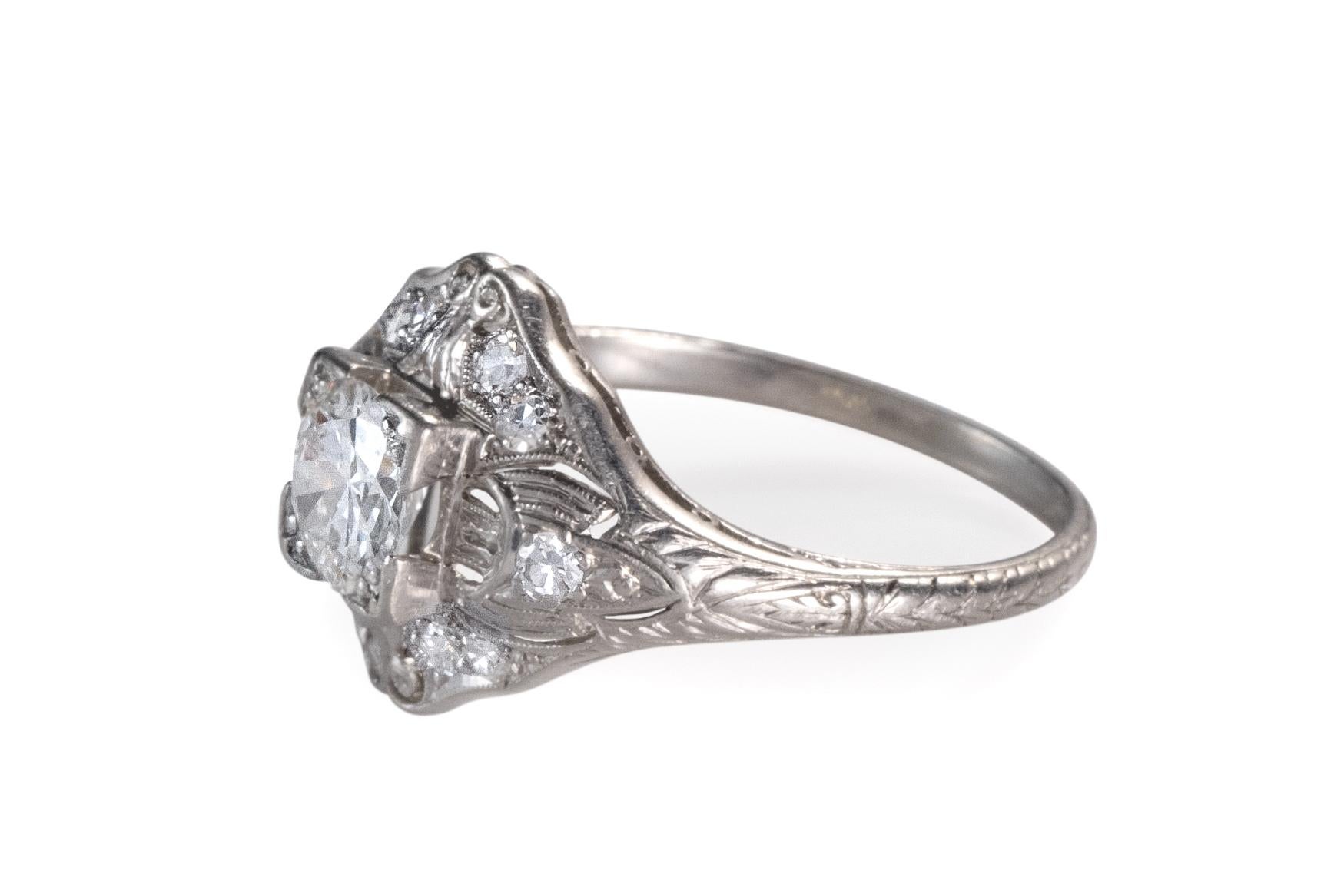 Art Deco 1920s .98 Carat Total Old European Diamond Platinum Engagement Ring For Sale