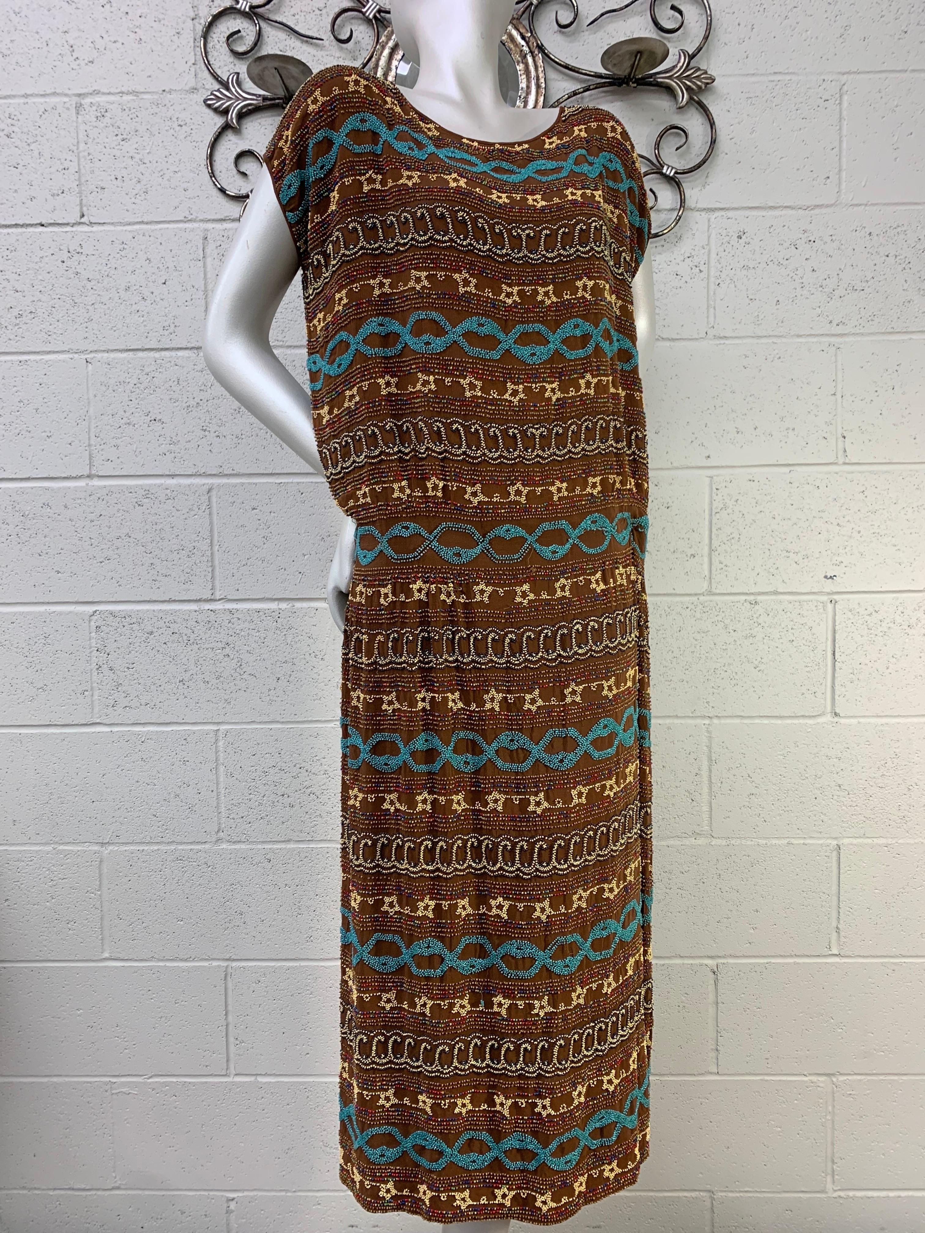 1920s Adair - France Bohemian Brown Silk Beaded Bohemian Tunic Dress: A rare example of this fine house's signature style beadwork (turquoise, yellow and black seed beading in horizontal banded motifs. Interior wide grograin drop-waist belt sits at