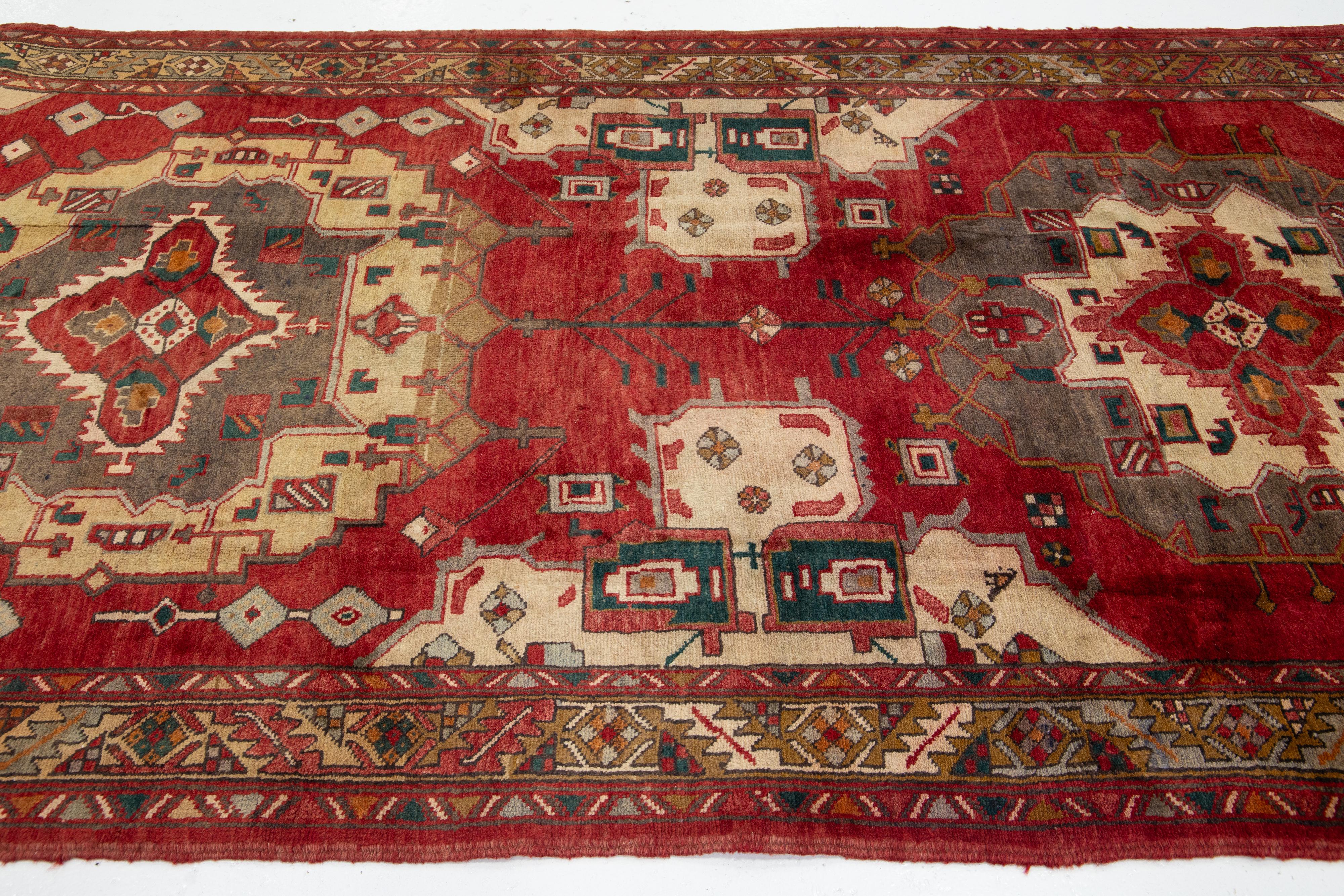 1940's Allover Designed Antique Heriz Wool Runner In Red In Excellent Condition For Sale In Norwalk, CT