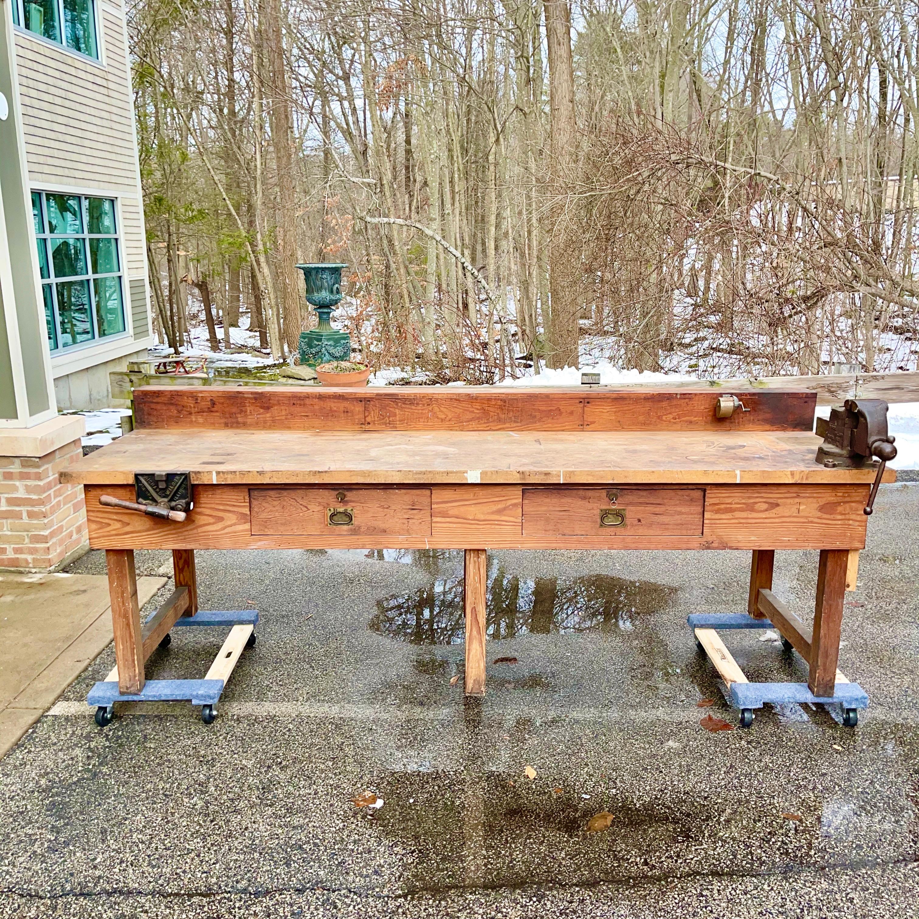 Authentic heavy duty work bench table made circa 1926
Two deep locking drawers with keys.
Richards-Wilcox quick-release woodworkers vise (Patent US1055278).
Bench dogs.
Rock Island Vise No. 51
From the George W. Treat house, Braintree, MA,