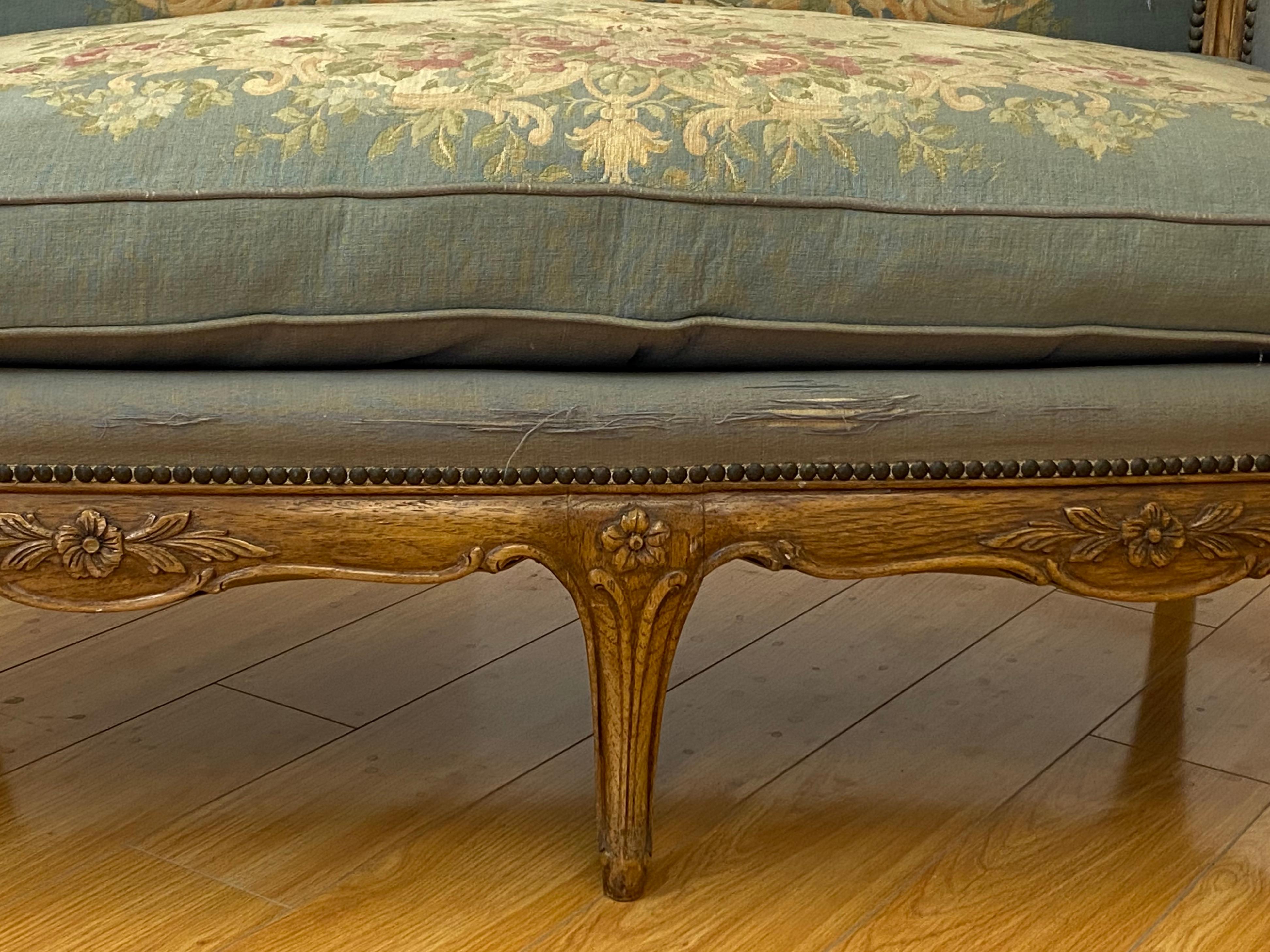 1920s American carved oak settee by Robert Irwin, Grand Rapids, MI

Gorgeous early 20th century hand carved oak settee by noted furniture maker Robert Irwin

The settee is covered with a cotton floral design tapestry upholstery and is filled