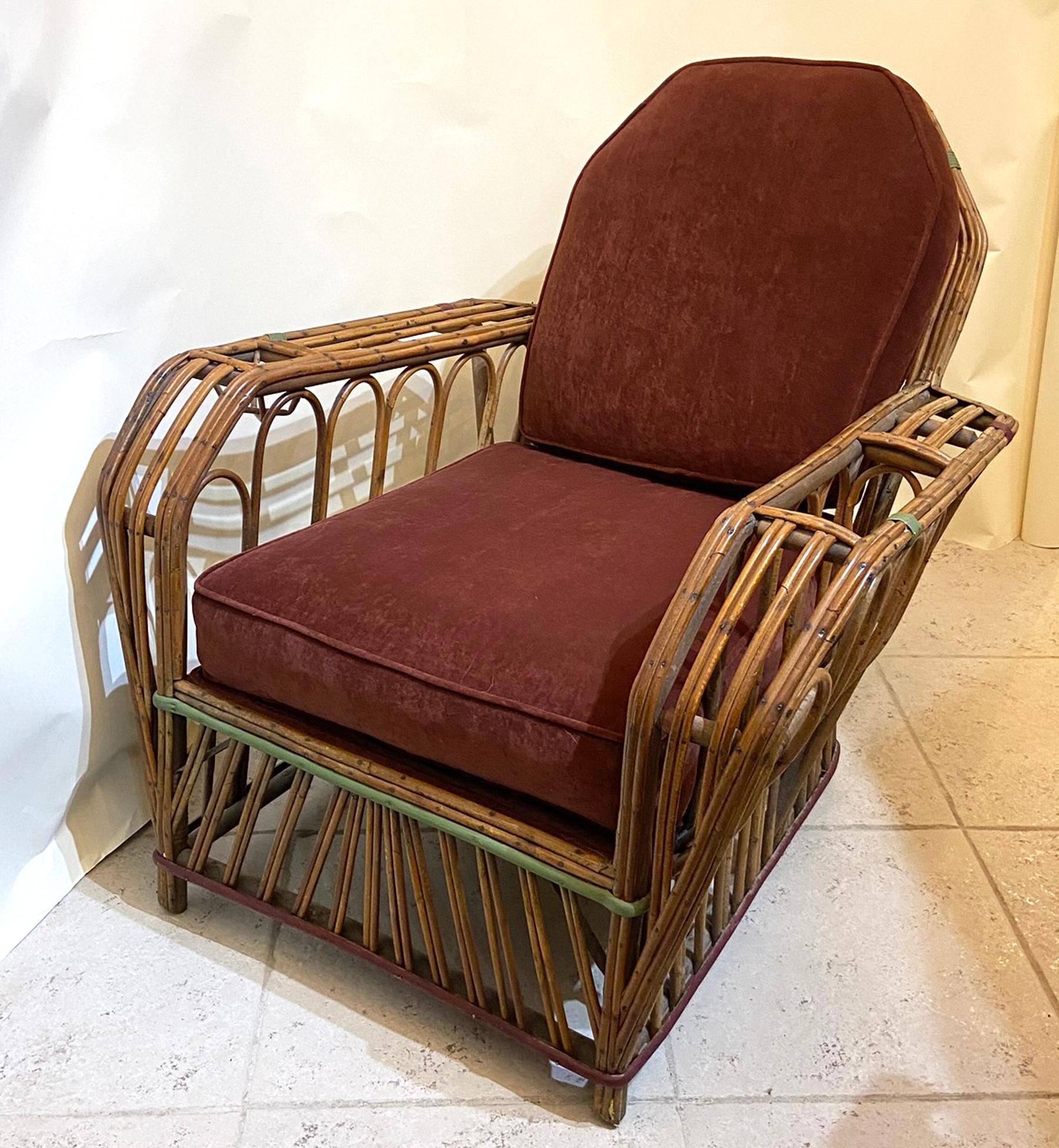 From late 1920s-early 1930s art Deco stick wicker lounge or club chairs. These chairs retain good original finish with original painted wraps. Rare to find this furniture with good original finish. Comfortable with updated cushions.