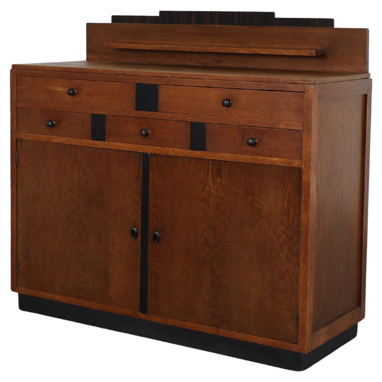 1920s Amsterdam School Oak Cabinet with Contrasting Ebonized Details For Sale
