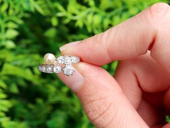 1920s 0.54 Carat Diamond and Pearl 14k Yellow Gold Ring