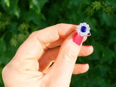 1920s 1.07 Carat Sapphire and 1.54 Carat Diamond Platinum Cluster Ring