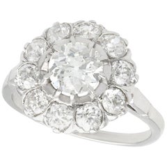 1920s Antique 2.36 Carat Diamond and Platinum Cluster Ring