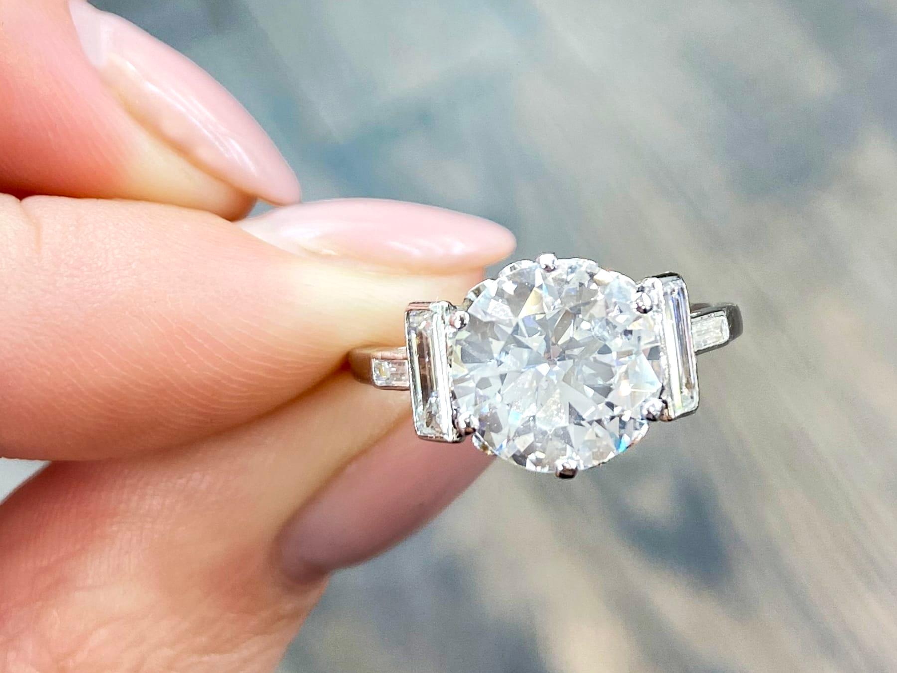 Old European Cut 3.16 Carat Old Cut Diamond Solitaire Engagement Ring with Baguette Side Stones For Sale