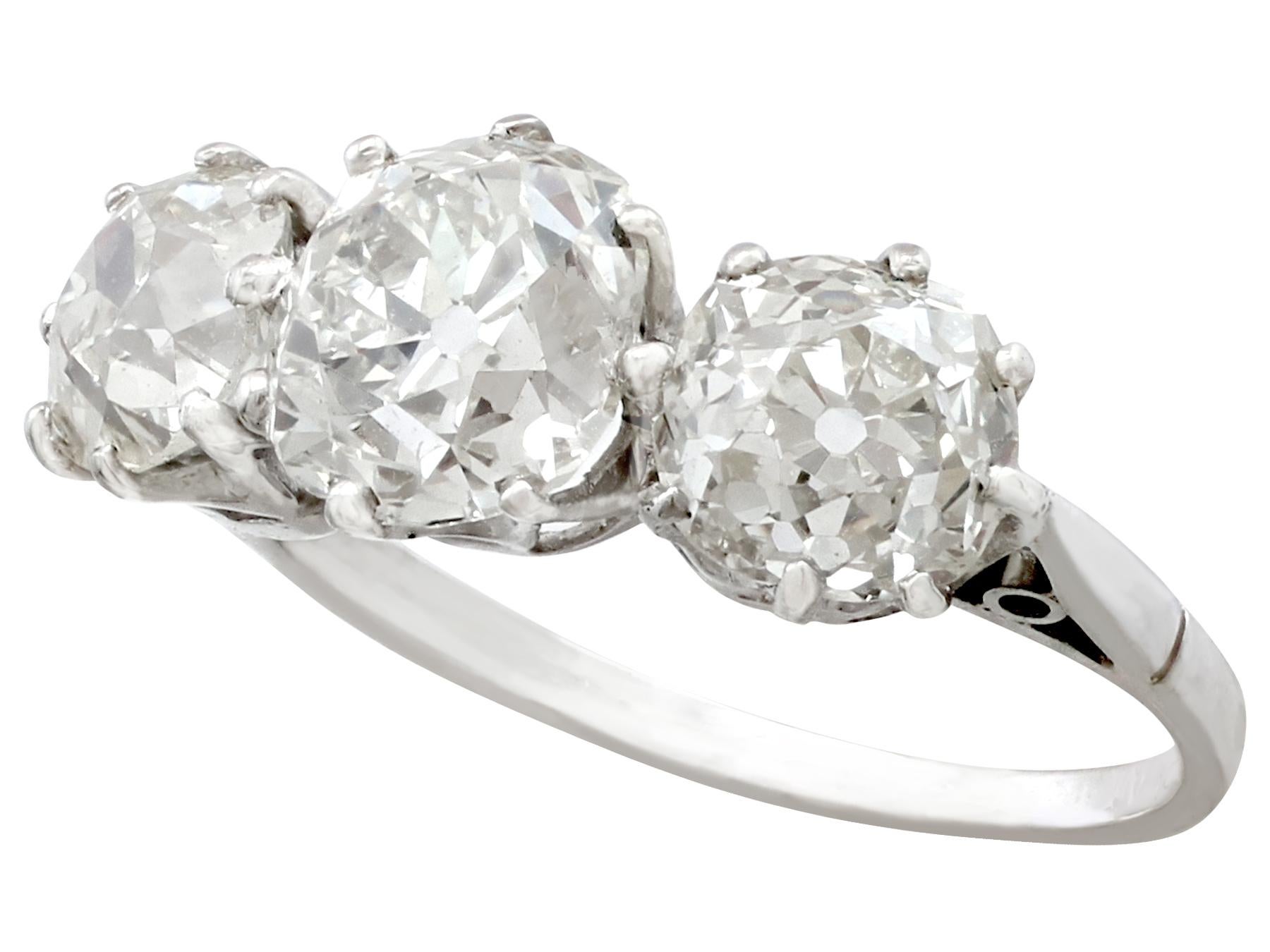 Women's or Men's 1920s Antique 3.72 Carat Diamond and Platinum Trilogy Ring