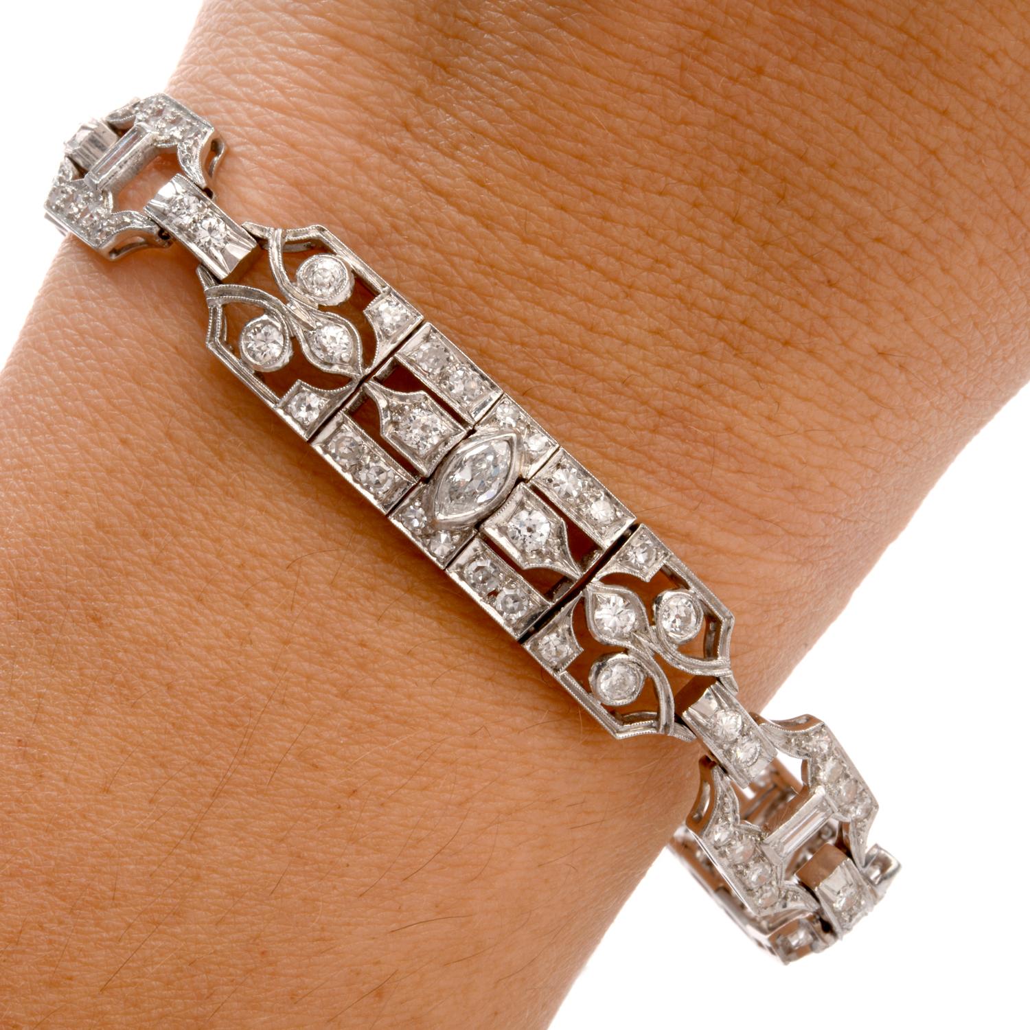 This Round, Marquise and Baguette cut Diamond Bracelet was inspired in an Art Deco geometric motif and crafted in Platinum. Intricate details and milgrain beading finish out the links filled with  a variety of cut Diamonds. Diamonds collectively