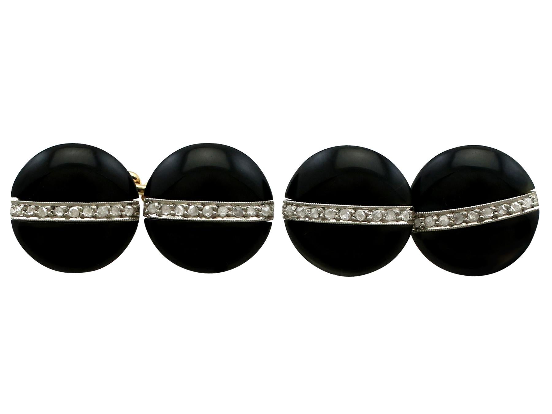 An impressive pair of Art Deco black onyx and 0.42 carat diamond, platinum and 18 karat yellow gold cufflinks; part of our diverse antique jewellery collections.

These fine and impressive rounded onyx and diamond cufflinks have been crafted in