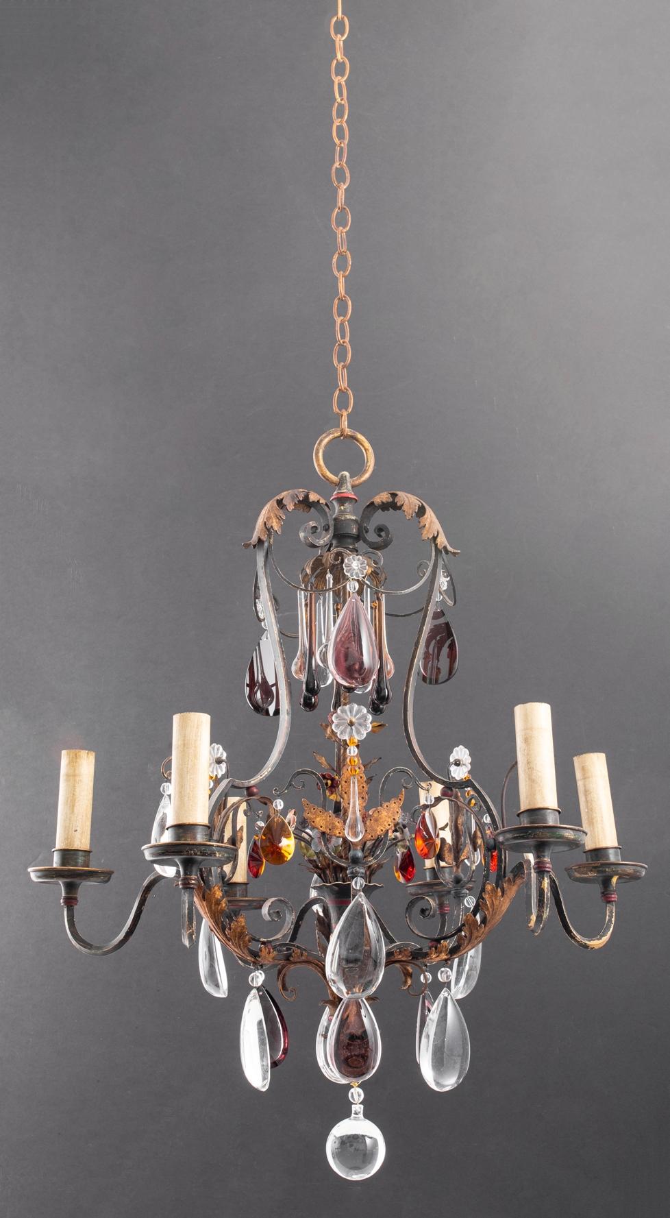 1920s antique Italian cast brass/iron chandelier with colored and clear pear shaped rock crystals with enamel flowers in the center of the iron frame. Chandelier has 6 arms. Recently rewired and restored. 

Dealer: R316TF.