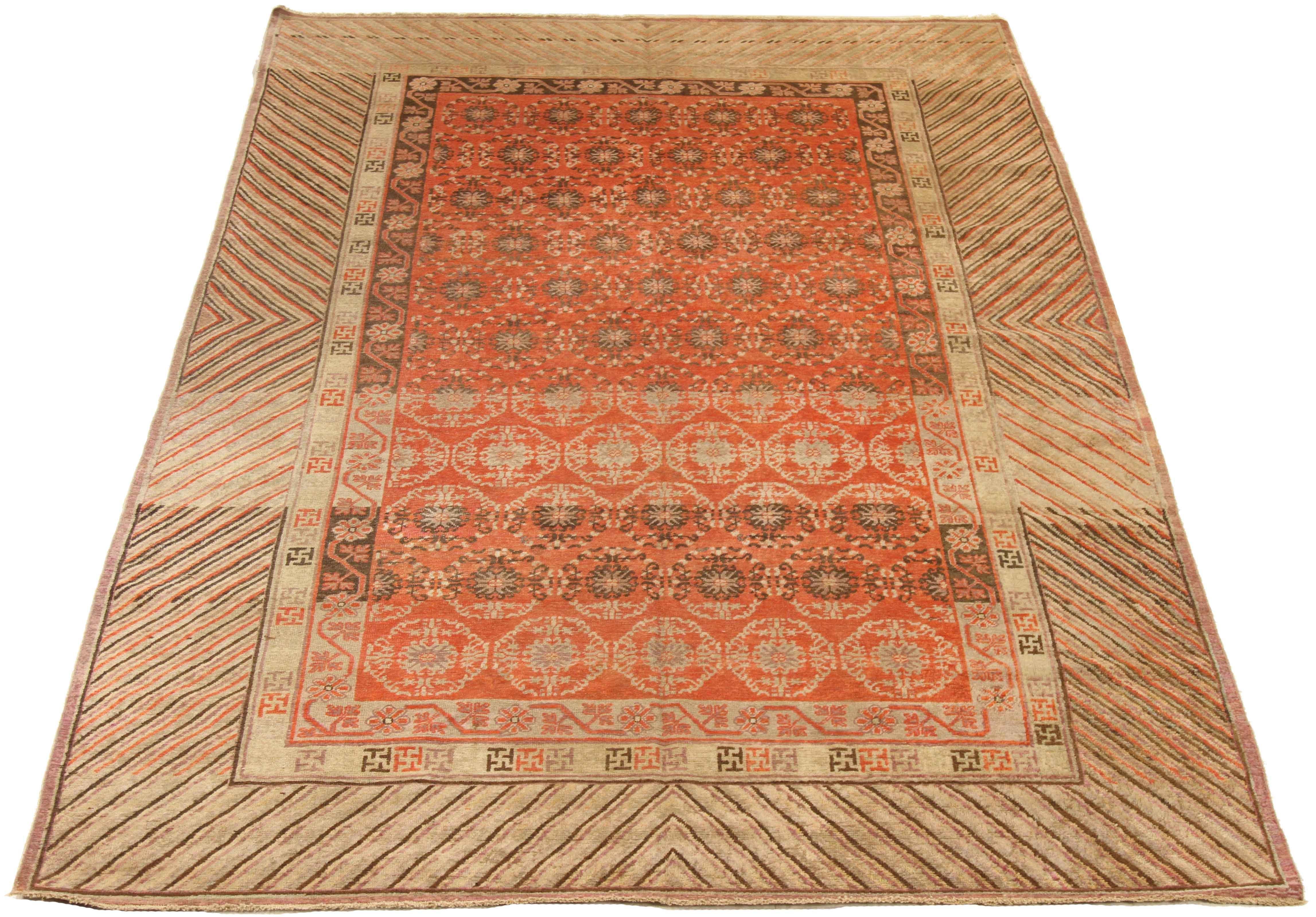 Hand-Knotted 1920s Antique Central Asian Rug Khotan Design with Vibrant Geometric Border For Sale