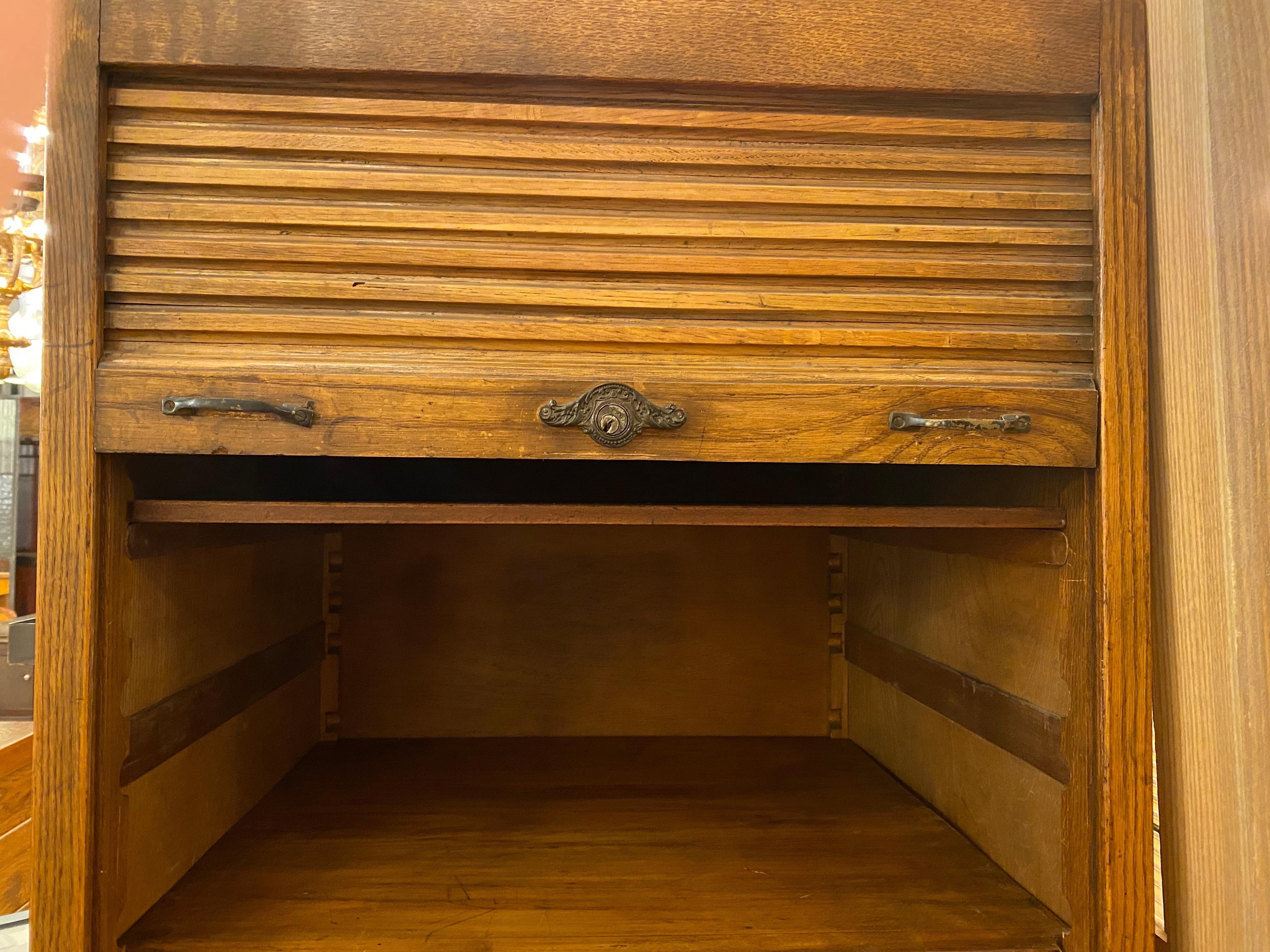 1920s Antique Chestnut Storage Cabinet w Rolldown Front 7