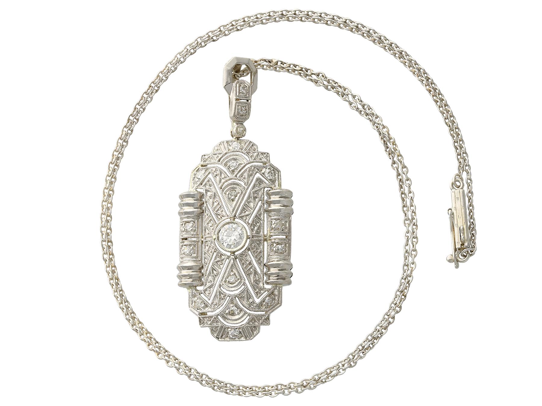 A stunning, fine and impressive antique 0.43 carat diamond and 14 karat white gold Art Deco pendant; part of our diverse antique jewelry and estate jewelry collections.

This stunning, fine and impressive antique Art Deco pendant has been crafted in