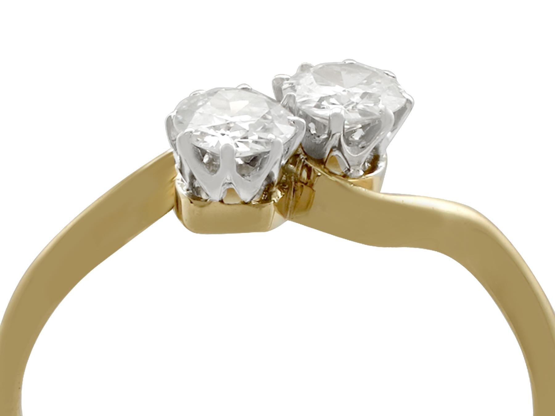 A fine and impressive platinum set antique 0.56 carat diamond twist ring in 18 karat yellow gold; part of our antique jewelry and estate jewelry collections

This impressive antique diamond twist ring has been crafted in 18k yellow gold with a