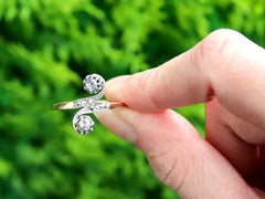 1920s Antique Diamond Yellow Gold and White Gold Set Twist Ring